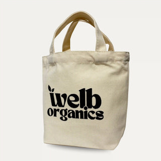 Beige tote bag with 'welb organics' text on a neutral background