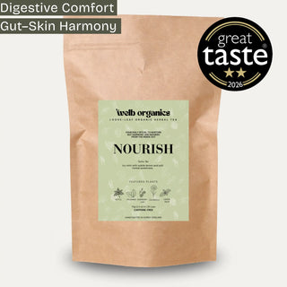 A kraft paper stand-up pouch of Well Organics Nourish herbal tea, shown on a light grey background with a black 'great taste 2026' badge and a 'Gut Harmony Antioxidant' label overlay.